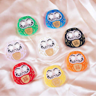 Colección de amuletos japoneses Daruma