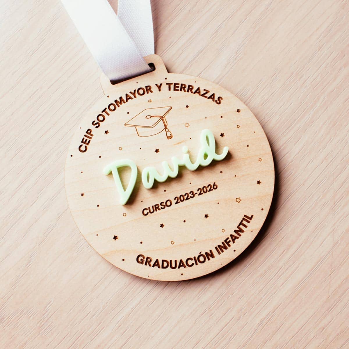Medalla de graduación de madera