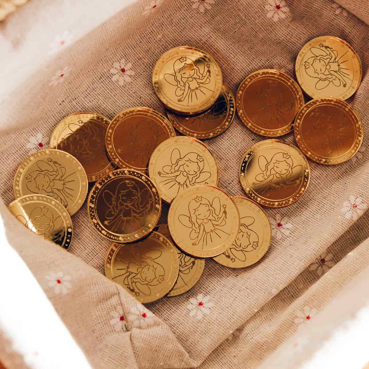 Monedas Hada de los Dientes Plano Medio dentro de una caja